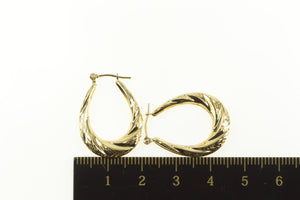 14K Puffy Scalloped Twist Oval Diamond Cut Hoop Earrings Yellow Gold