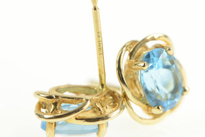 14K Oval Blue Topaz Twist Trim Classic Stud Earrings Yellow Gold