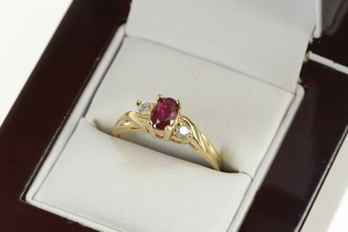 10K Oval Syn. Ruby CZ Accent Classic Statement Ring Yellow Gold