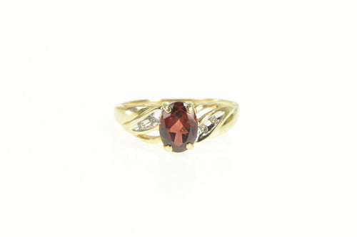 14K Oval Garnet Diamond Wavy Accent Ring Yellow Gold