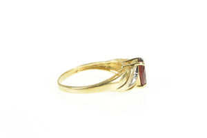 14K Oval Garnet Diamond Wavy Accent Ring Yellow Gold