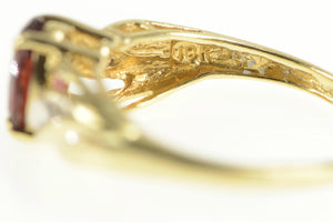 14K Oval Garnet Diamond Wavy Accent Ring Yellow Gold