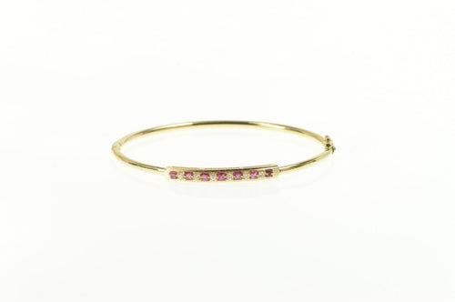 14K 0.75 Ctw Ruby Diamond Inset Oval Bangle Bracelet 7