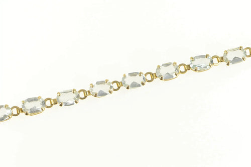 14K Oval Sim. Blue Topaz Classic Tennis Bracelet 7