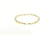 Load image into Gallery viewer, 14K Oval Sim. Blue Topaz Classic Tennis Bracelet 7&quot; Yellow Gold