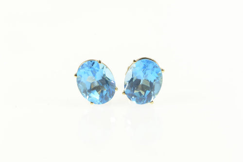 14K Oval Blue Topaz Solitaire Classic Stud Earrings Yellow Gold