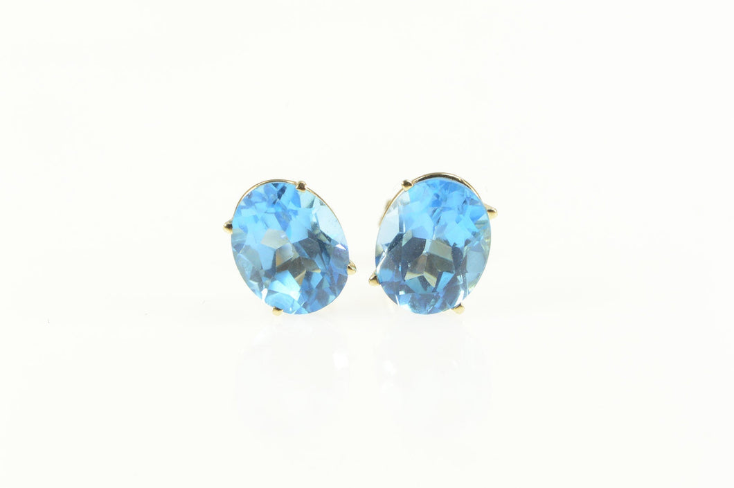 14K Oval Blue Topaz Solitaire Classic Stud Earrings Yellow Gold