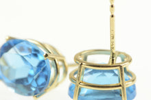 Load image into Gallery viewer, 14K Oval Blue Topaz Solitaire Classic Stud Earrings Yellow Gold
