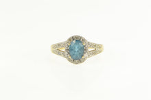 Load image into Gallery viewer, 14K Oval Blue Topaz Diamond Halo Engagement Ring Yellow Gold