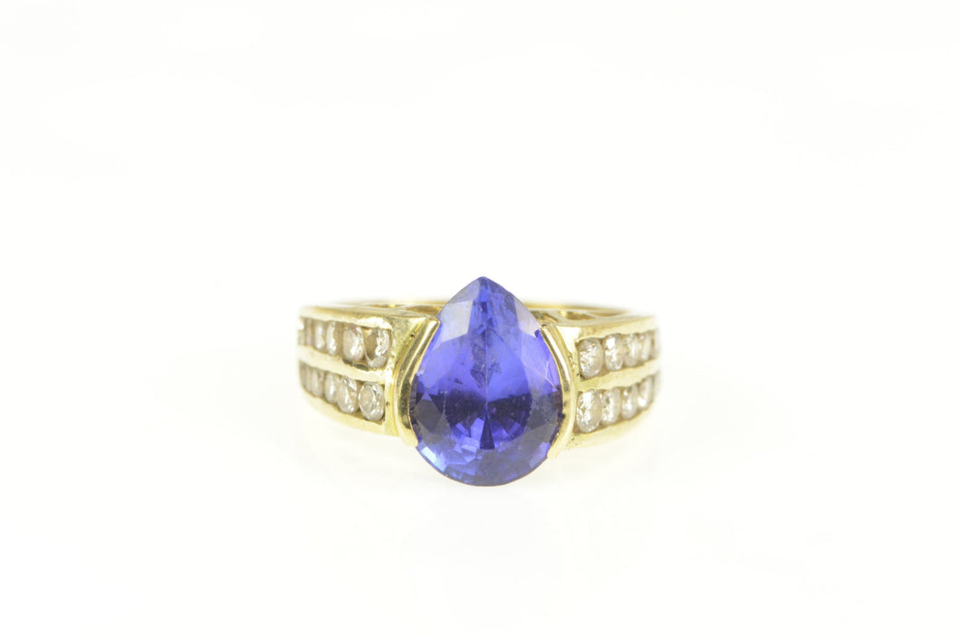 18K Pear Tanzanite Diamond Channel Accent Ring Yellow Gold