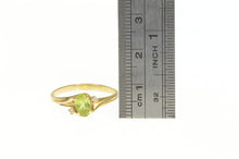 Load image into Gallery viewer, 10K Vintage Bypass Oval Peridot &amp; Diamond Ring Yellow Gold