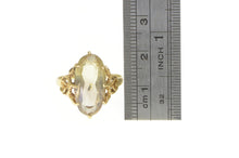 Load image into Gallery viewer, 10K Oval Smoky Quartz Flower Accent Cocktail Ring Yellow Gold