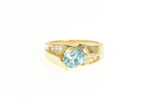 14K Oval Blue Topaz Diamond Ornate Bypass Ring Yellow Gold