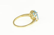 Load image into Gallery viewer, 14K Blue Topaz Diamond Accent Halo Statement Ring Yellow Gold