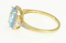 Load image into Gallery viewer, 14K Blue Topaz Diamond Accent Halo Statement Ring Yellow Gold