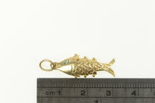 Load image into Gallery viewer, 14K 3D Articulated Fish Sim. Blue Topaz Eye Charm/Pendant Yellow Gold