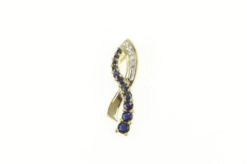 10K Classic Loop Criss Cross Synthetic Sapphire CZ Pendant Yellow Gold