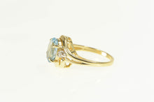 Load image into Gallery viewer, 14K Oval Blue Topaz Diamond Accent Statement Ring Yellow Gold