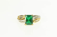 Load image into Gallery viewer, 10K Emerald Cut Synthetic Emerald Diamond Two Tone Ring Yellow Gold