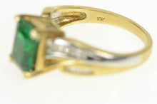 Load image into Gallery viewer, 10K Emerald Cut Synthetic Emerald Diamond Two Tone Ring Yellow Gold