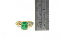 Load image into Gallery viewer, 10K Emerald Cut Synthetic Emerald Diamond Two Tone Ring Yellow Gold