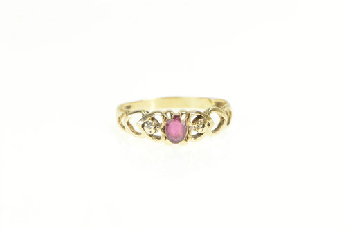 10K Oval Natural Ruby Diamond Accent Heart Ring Yellow Gold