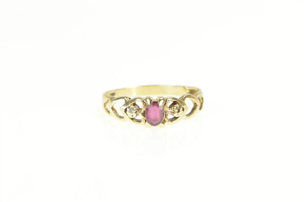 10K Oval Natural Ruby Diamond Accent Heart Ring Yellow Gold