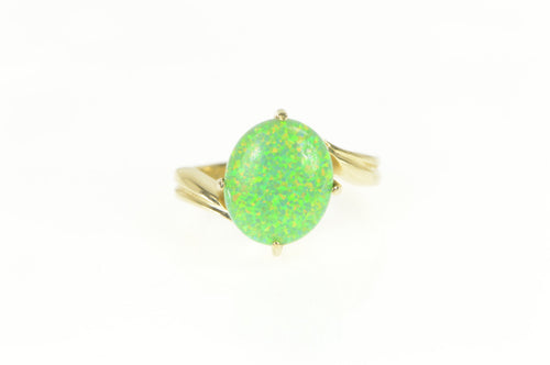 14K Oval Vibrante Green Syn. Opal Bypass Ring Yellow Gold