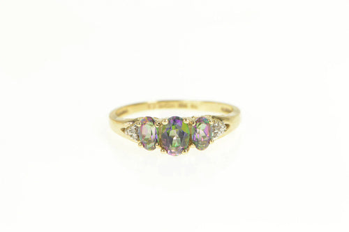 10K Three Stone Oval Mystic Topaz CZ Accent Ring Yellow Gold