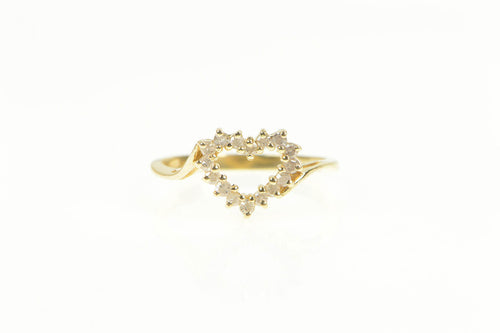 14K 0.24 Ctw Diamond Heart Love Symbol Bypass Ring Yellow Gold