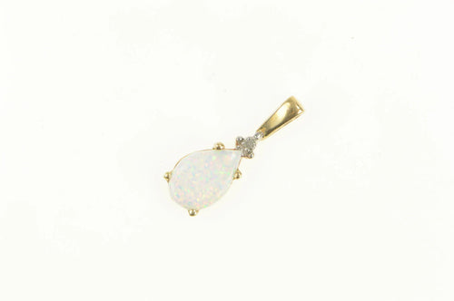 10K Pear Sim. Opal Diamond Accent Statement Pendant Yellow Gold