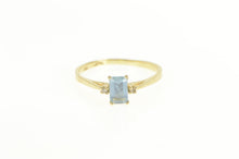 Load image into Gallery viewer, 10K Emerald Cut Blue Topaz Diamond Accent Ring Yellow Gold
