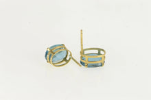 Load image into Gallery viewer, 14K Oval Blue Topaz Solitaire Classic Stud Earrings Yellow Gold