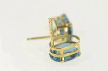 Load image into Gallery viewer, 14K Oval Blue Topaz Solitaire Classic Stud Earrings Yellow Gold