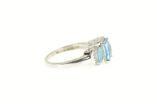 Load image into Gallery viewer, 10K Blue Topaz Three Stone Diamond Halo Ring White Gold