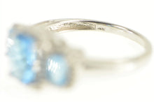 Load image into Gallery viewer, 10K Blue Topaz Three Stone Diamond Halo Ring White Gold