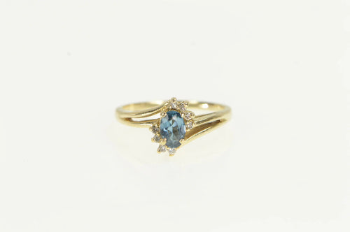 10K Marquise Blue Topaz Diamond Bypass Ring Yellow Gold