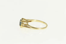 Load image into Gallery viewer, 10K Marquise Blue Topaz Diamond Bypass Ring Yellow Gold