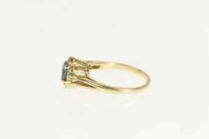 10K Marquise Blue Topaz Diamond Bypass Ring Yellow Gold