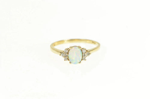 10K Oval Syn. Opal Diamond Cluster Accent Ring Yellow Gold