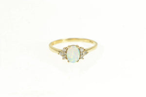 10K Oval Syn. Opal Diamond Cluster Accent Ring Yellow Gold