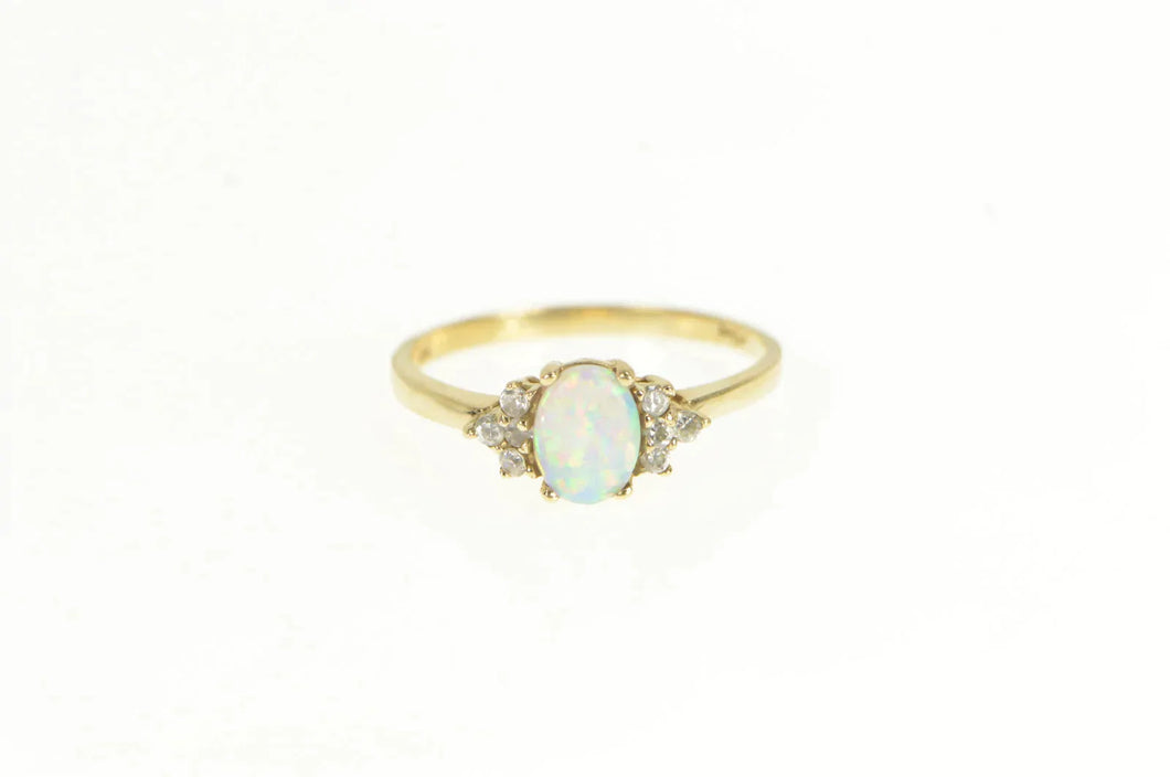 10K Oval Syn. Opal Diamond Cluster Accent Ring Yellow Gold