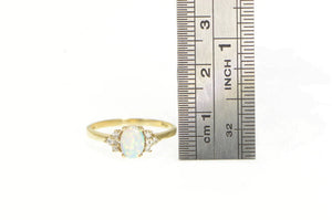 10K Oval Syn. Opal Diamond Cluster Accent Ring Yellow Gold