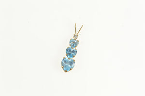 10K Tiered Blue Topaz Heart CZ Accent Classic Charm/Pendant Yellow Gold
