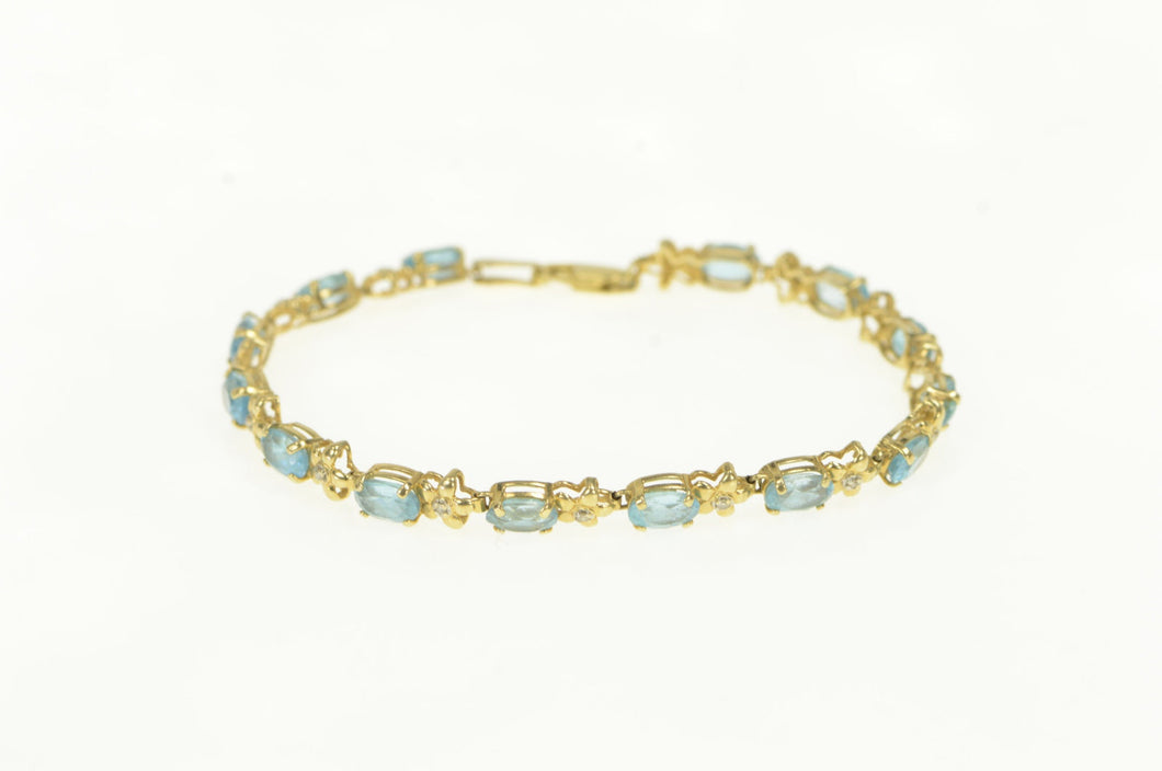 14K Oval Blue Topaz Diamond Flower Tennis Bracelet 7