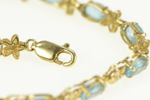 Load image into Gallery viewer, 14K Oval Blue Topaz Diamond Flower Tennis Bracelet 7&quot; Yellow Gold