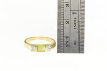 Load image into Gallery viewer, 14K Emerald Cut Peridot Diamond Accent Ring Yellow Gold