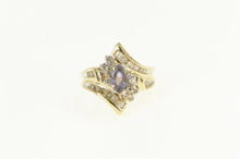 Load image into Gallery viewer, 14K Tanzanite Baguette Diamond Bypass Ring Yellow Gold
